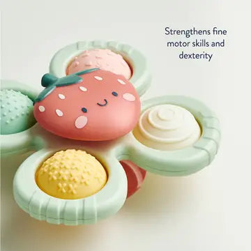 Top view of Itzy Pop & Whirl strawberry suction toy.