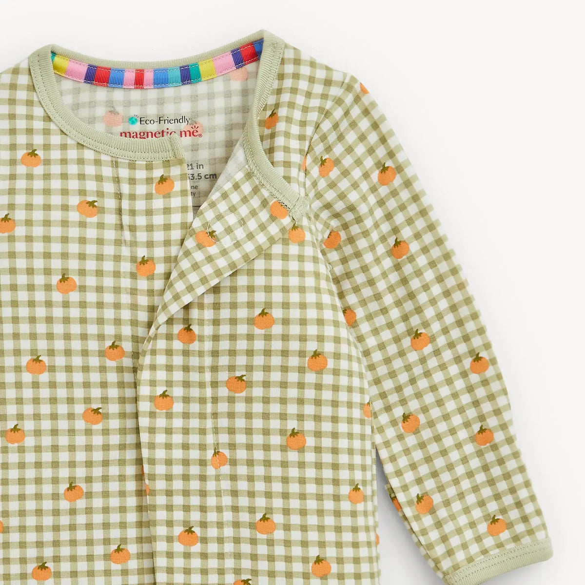 Close-up of the hidden magnetic front closure and colorful interior neckline trim on the Pumpkin Plaid footie.
