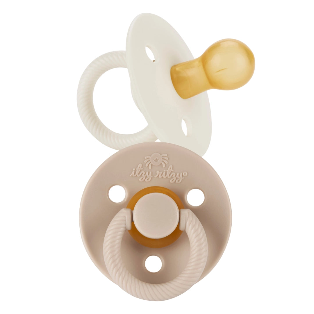 Itzy Ritzy Itzy Soother natural rubber pacifier 2-pack in Coconut and Toast.