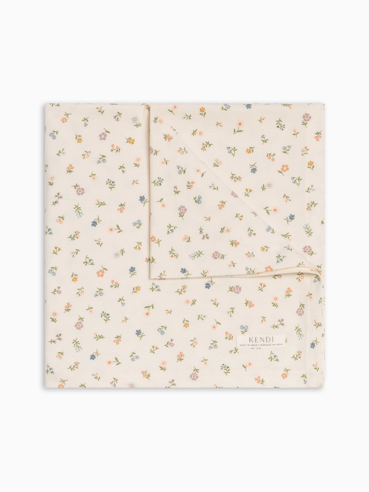 Colored Organics Petaline Floral organic cotton swaddle blanket in cream.