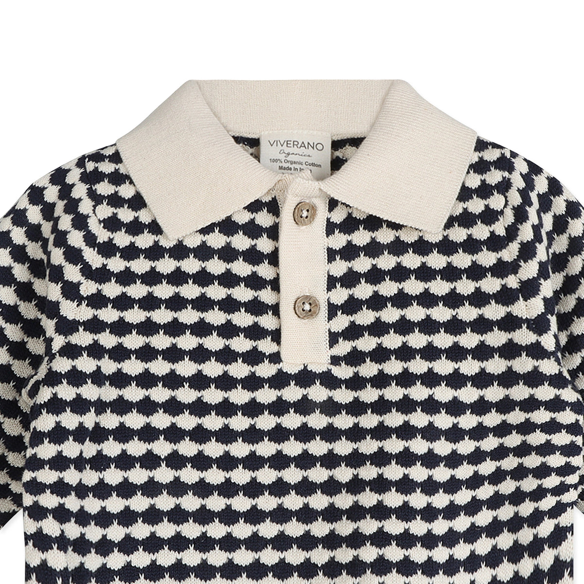 Close-up of the Navy and Cream Textured Organic Cotton Knit Polo Pullover.