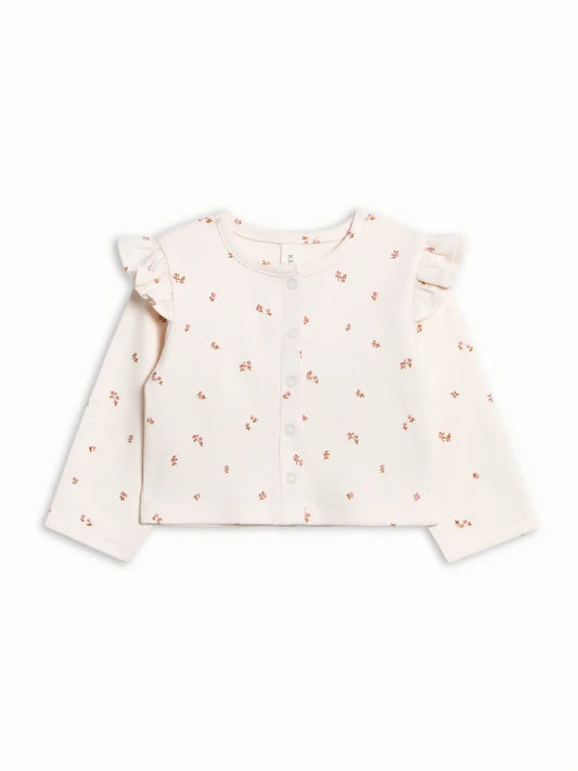 Colored Organics Hazel Cardigan in Etta Floral, a cream long-sleeve cardigan with tiny flowers, ruffled shoulders, and front snaps.