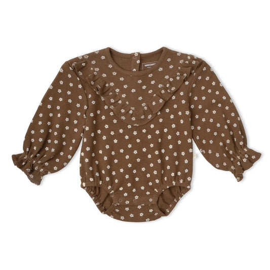 Makemake Organics Organic Ruffle Bubble Romper in Chestnut Bloom floral print with long sleeves.