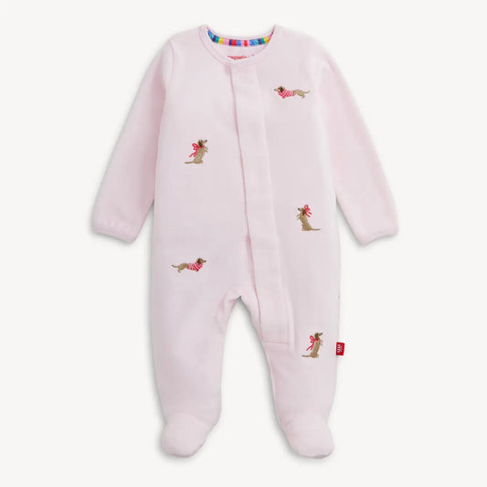 Pink Magnetic Me velour baby footie with playful embroidered dogs.