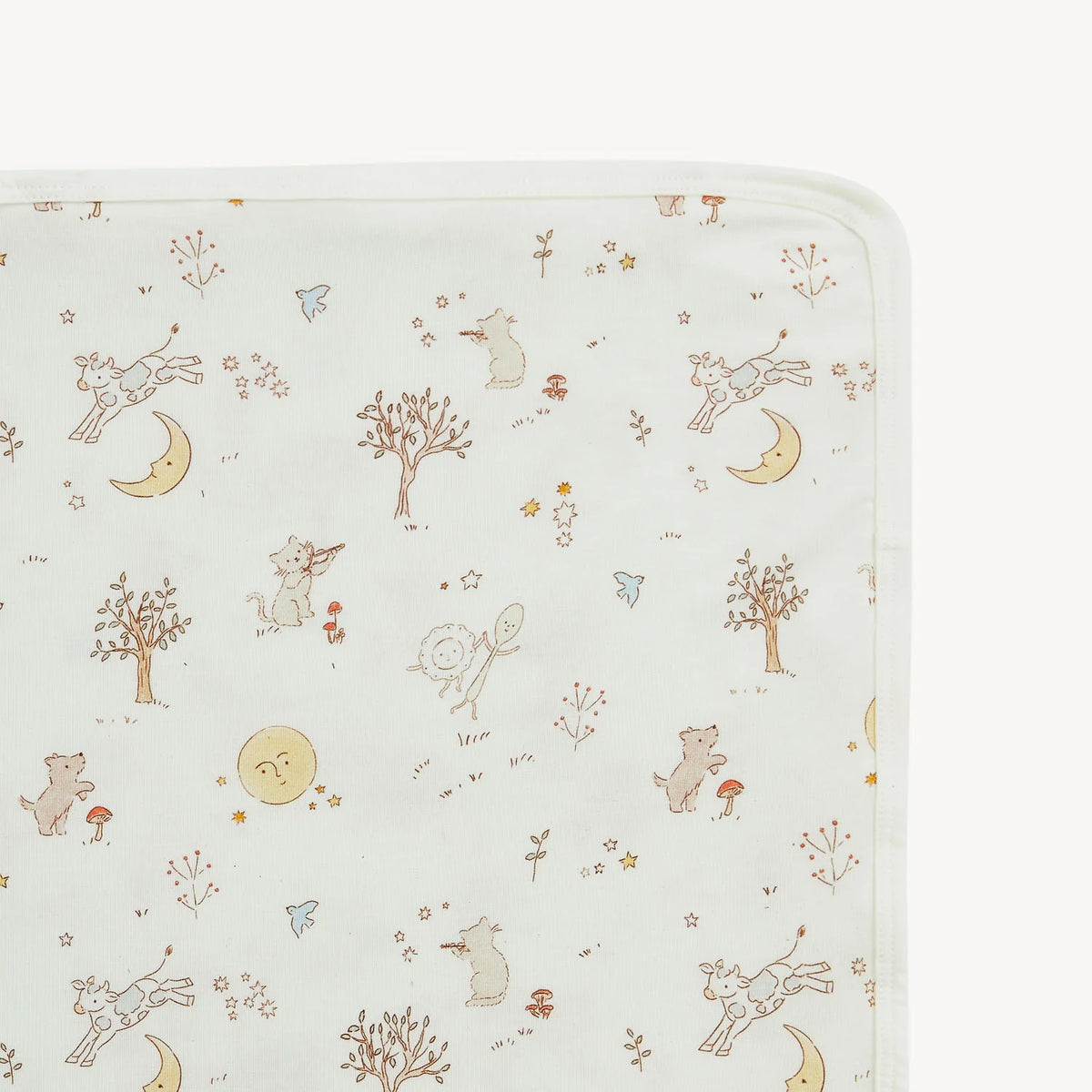 Close-up of Bedtime Rhymes modal baby blanket storybook print and cream border.  