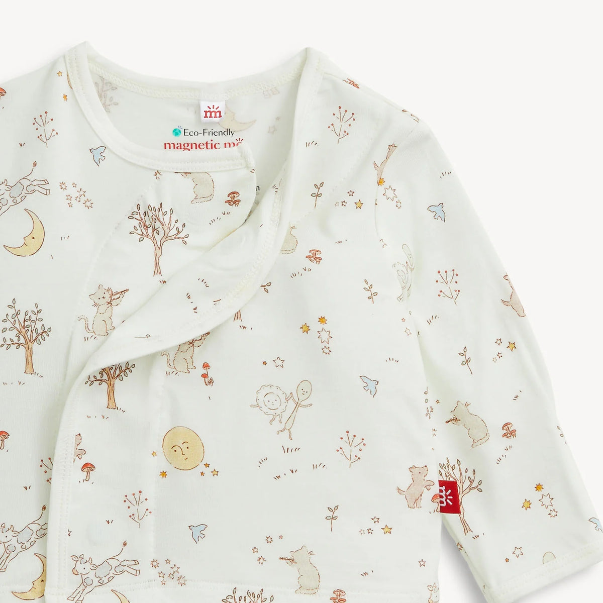 Close-up of Bedtime Rhymes modal wrap top, storybook print and magnetic closure.