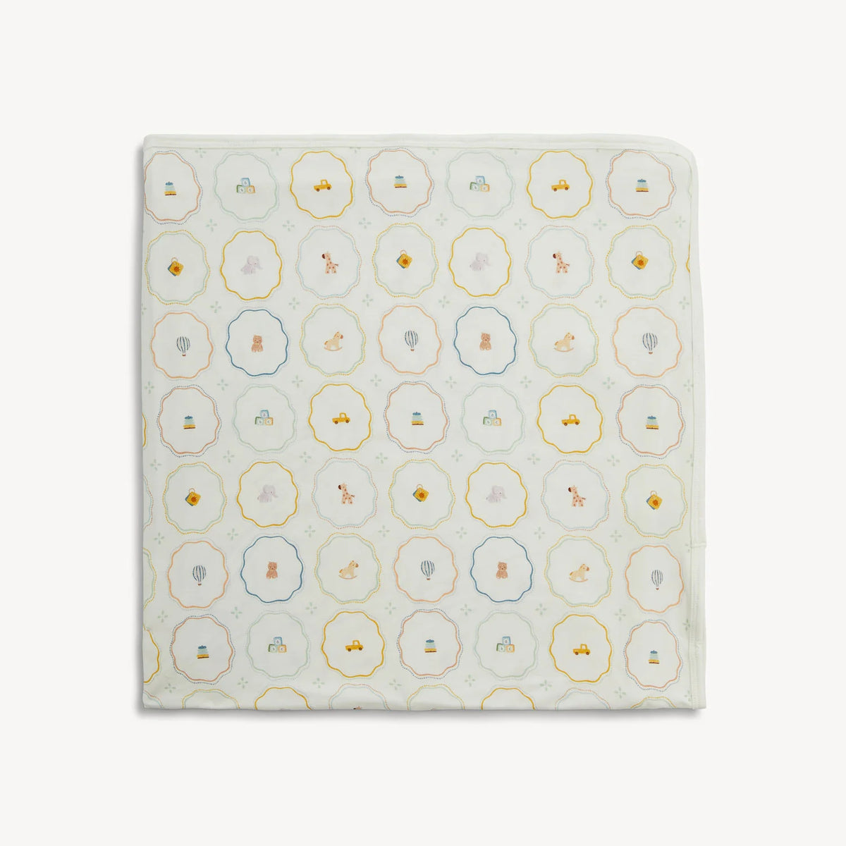 Magnetic Me Nursery Magic cream modal baby blanket with nursery-inspired print.
