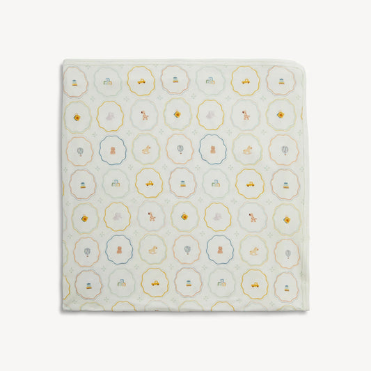 Magnetic Me Nursery Magic cream modal baby blanket with nursery-inspired print.
