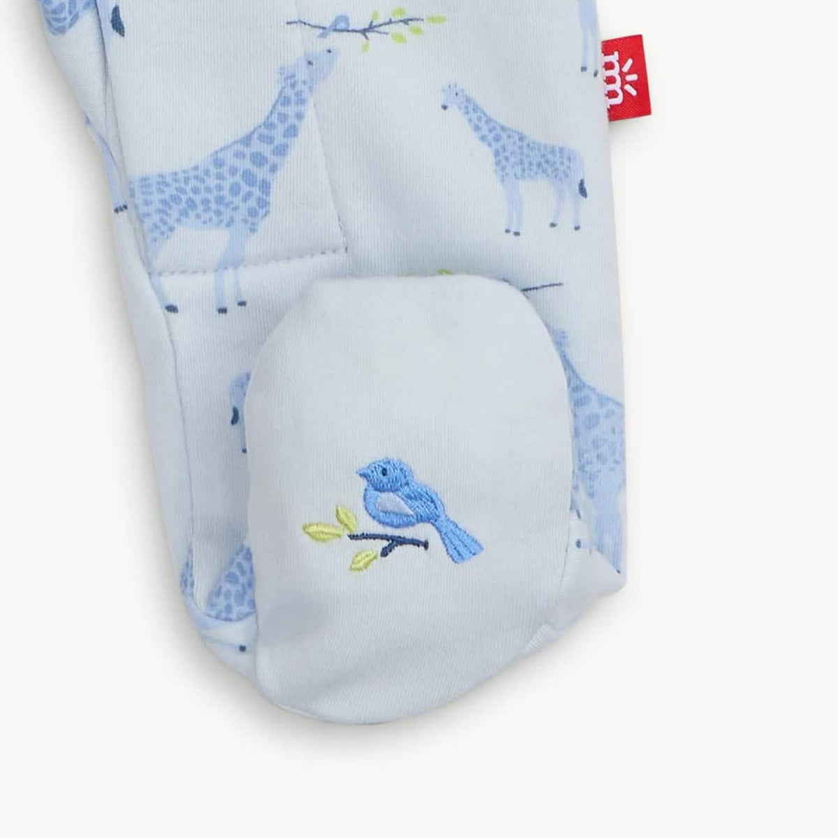Blue Jolie Giraffe footie with embroidered foot detail. 