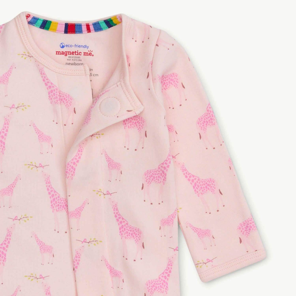 Close-up of Pink Jolie Giraffe print and magnetic closure.